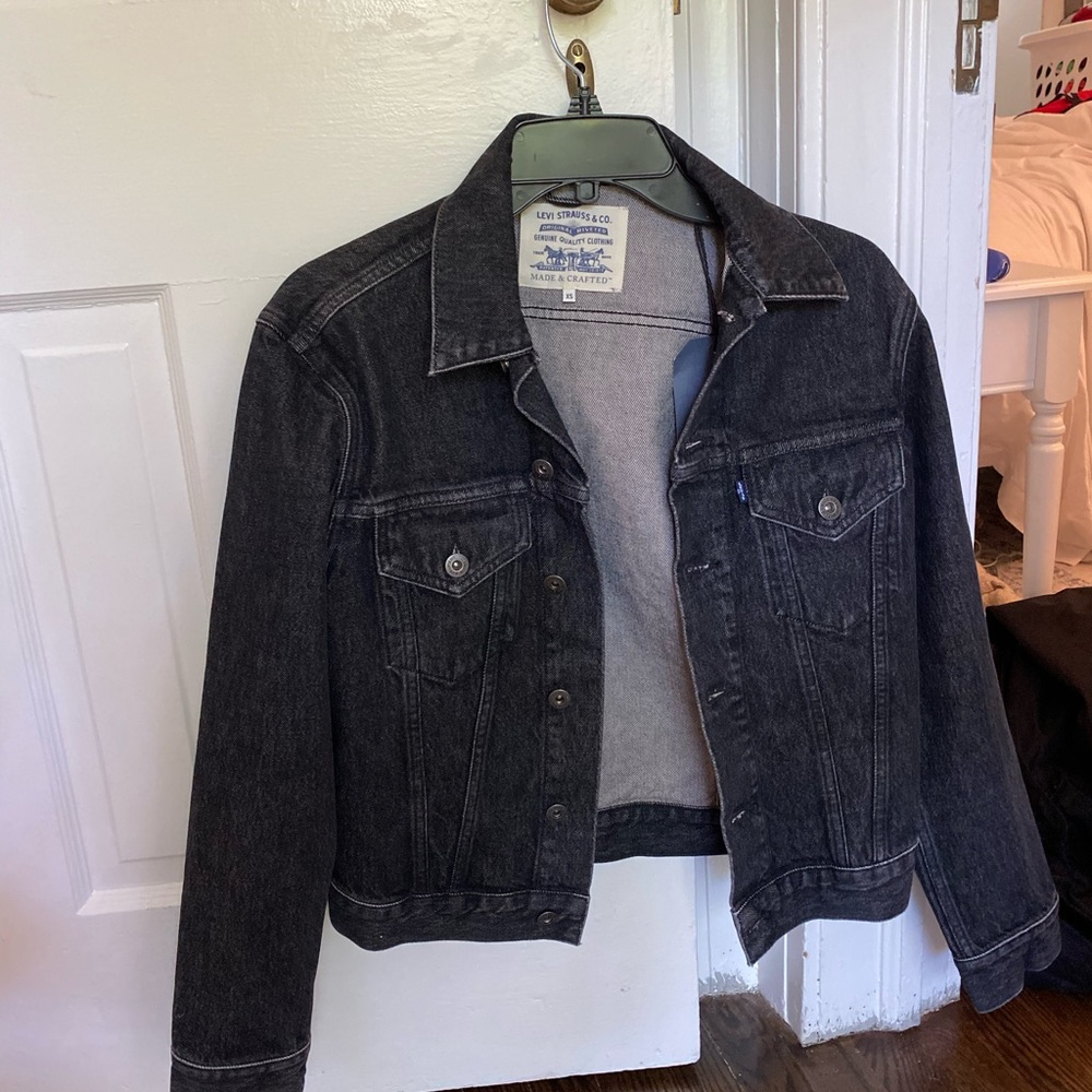 Brand new women’s Levi’s black denim jacket